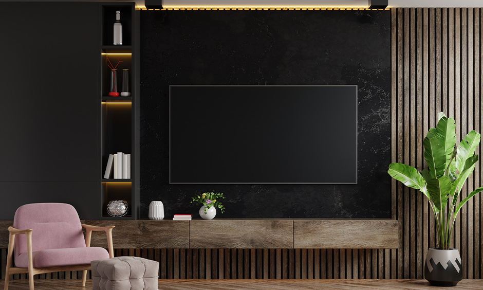 Black marble used for stunning TV unit which acts as a show-stopper