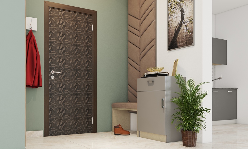 Sunmica flush door with a semi-circle pattern adds an artistic touch to the living space