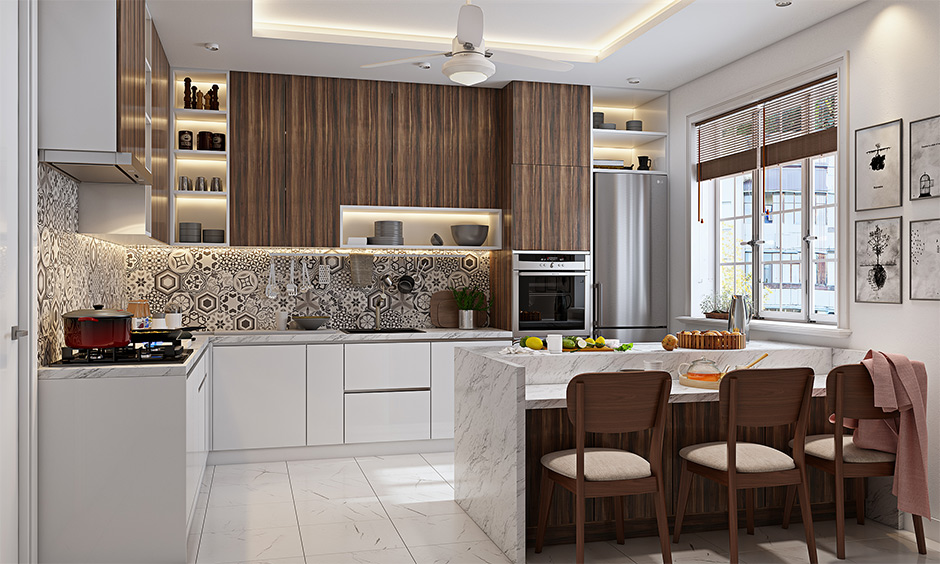 Kitchen peninsula design which has small potted plants to bring nature indoors