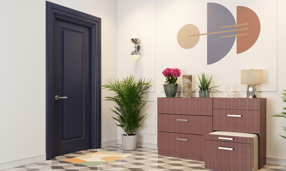 A bold blue mica flush door design creates a serene, inviting entryway that sets the tone for the home's interior
