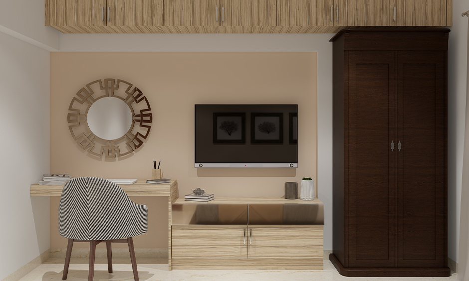 Small wooden Almirah design in dark brown with carved door knobs