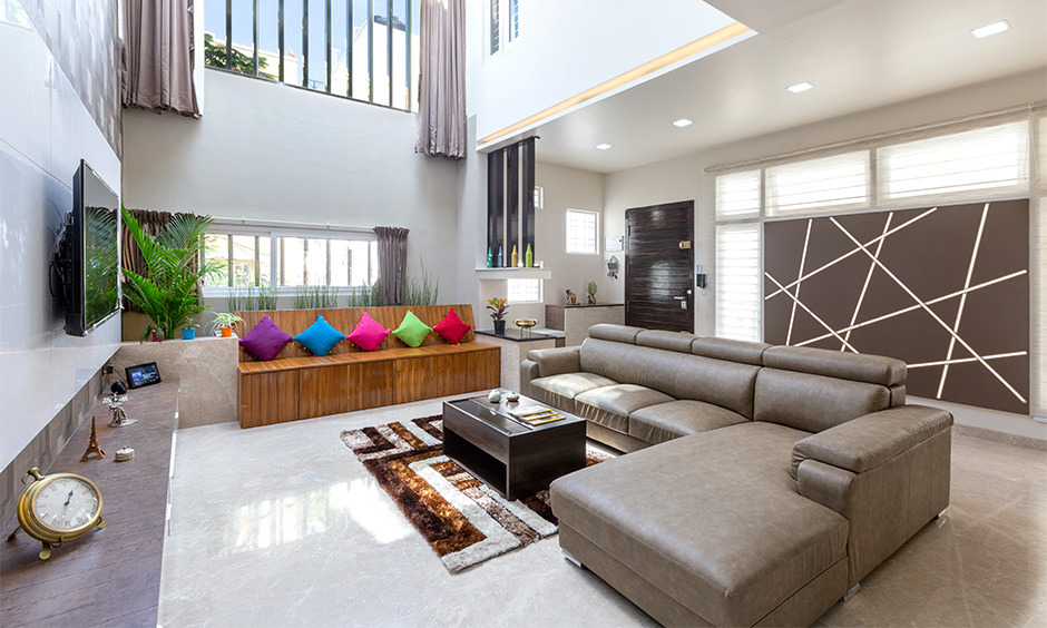 Living room sofa bench design with colourful cushions to steal the show
