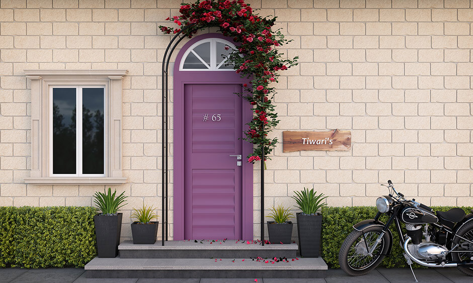A modest, wood-carved door design that enhances the home's entrance with a lively and inviting touch