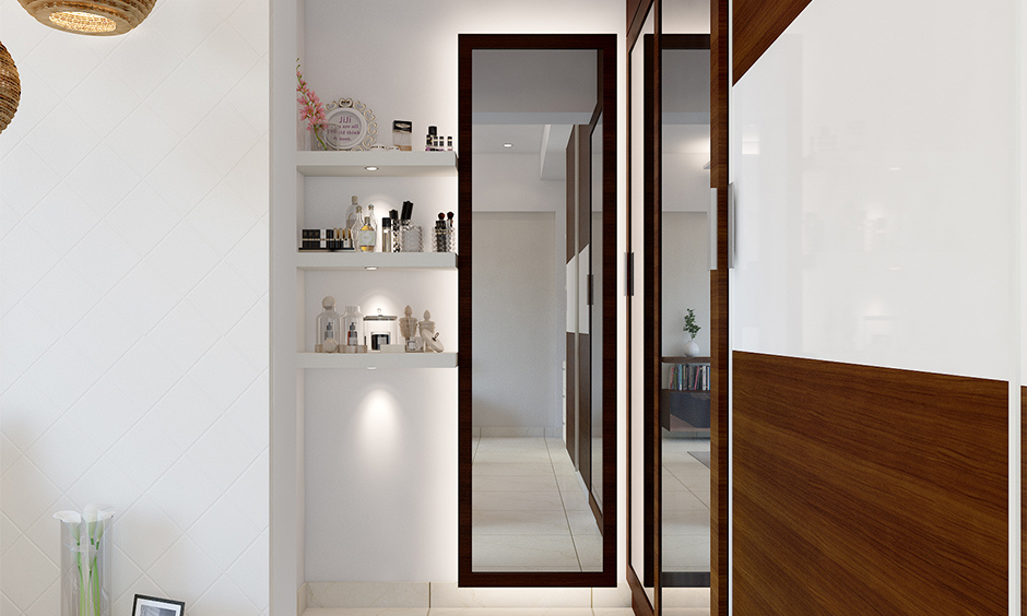 A full-length bedroom mirror design with lights, optimising space and adding elegance