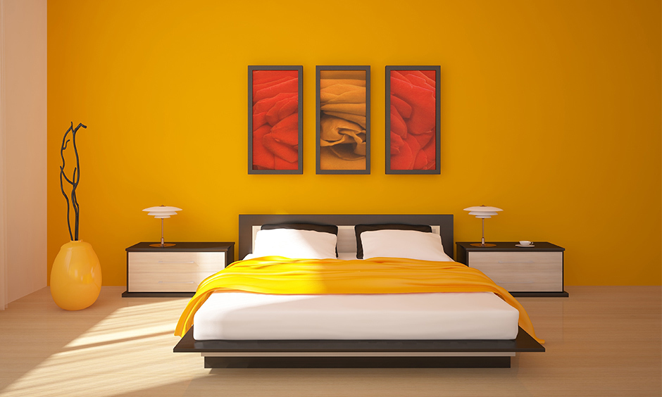 Stylish bedroom colour combination with monochrome-orange wall
