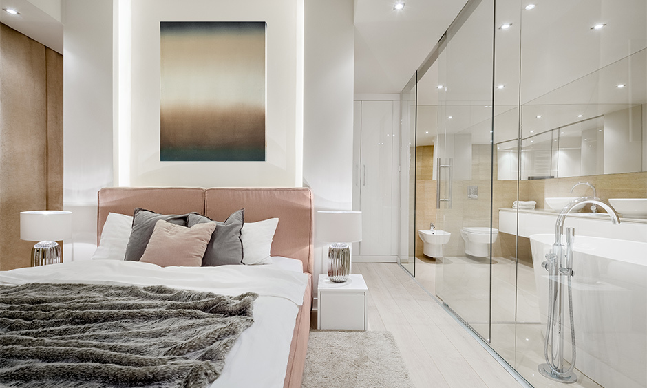Double-walled glasses separating bedroom and bathroom