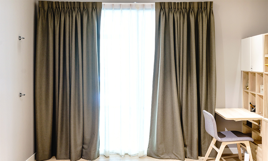 Pinch pleated type of curtain making the room appear luxurious