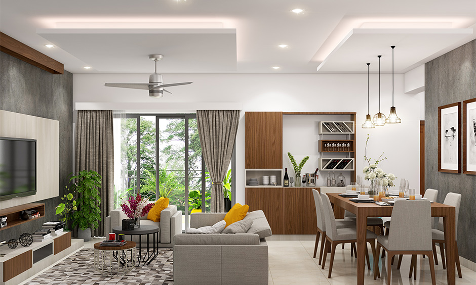 An elegant POP-down ceiling design complements nature-inspired living and dining spaces
