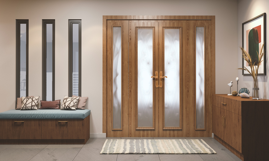 Wooden door handle with a lever on a backplate combines timeless charm and easy functionality