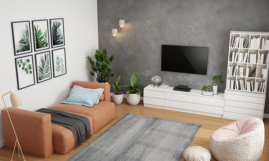 Grey and pastel living room with coral couch and refined decor, exuding sophistication