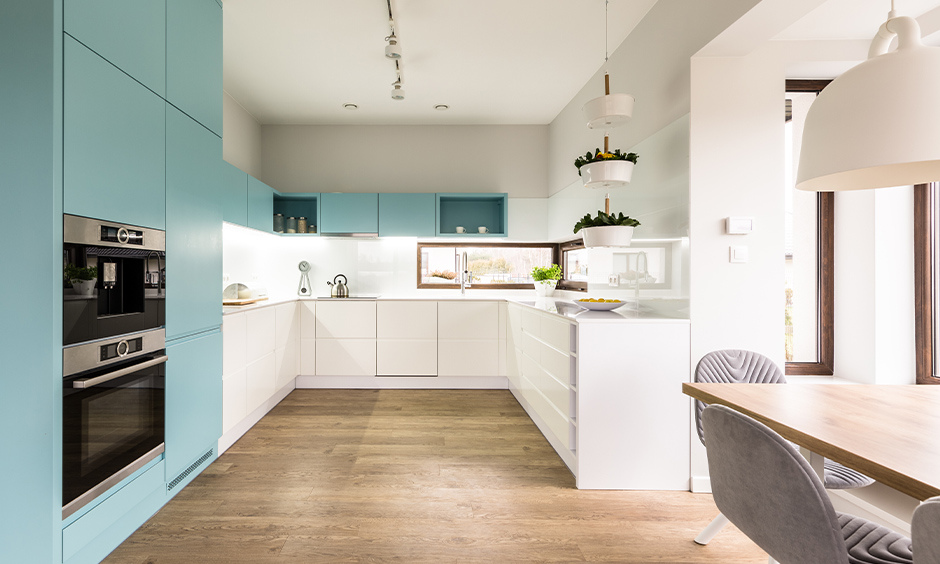 A light blue and white kitchen with classic charm and a clean, bright aesthetic for timeless appeal