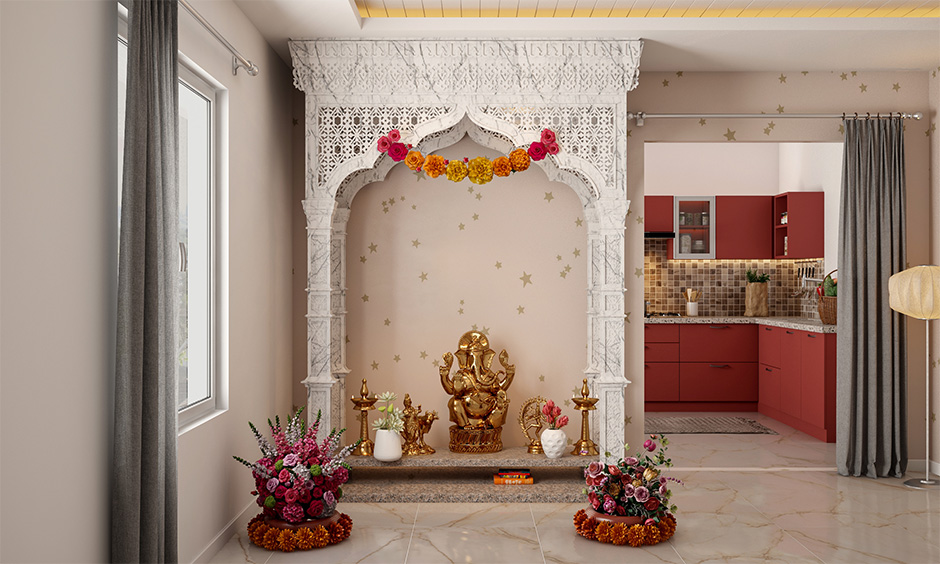 Simple marble mandir design with intricate carvings, perfect for a peaceful home temple