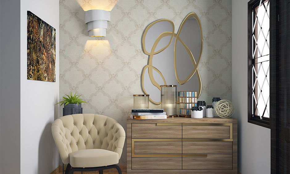 Simple white colour wallpaper with intricate motifs transforms idle corners into cosy reading nooks