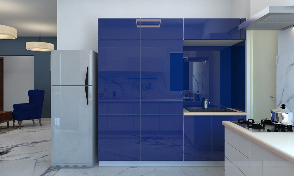 Two-tone blue and white kitchen cabinets offering individuality and depth while keeping the space light and airy