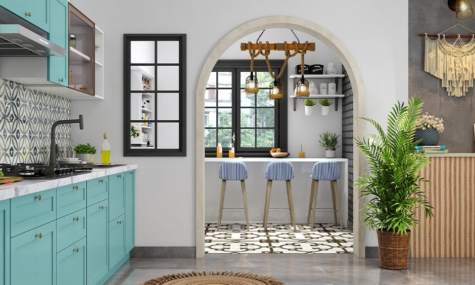 Coastal chic interior design with wooden hues, striped barstools, and a stylish chandelier