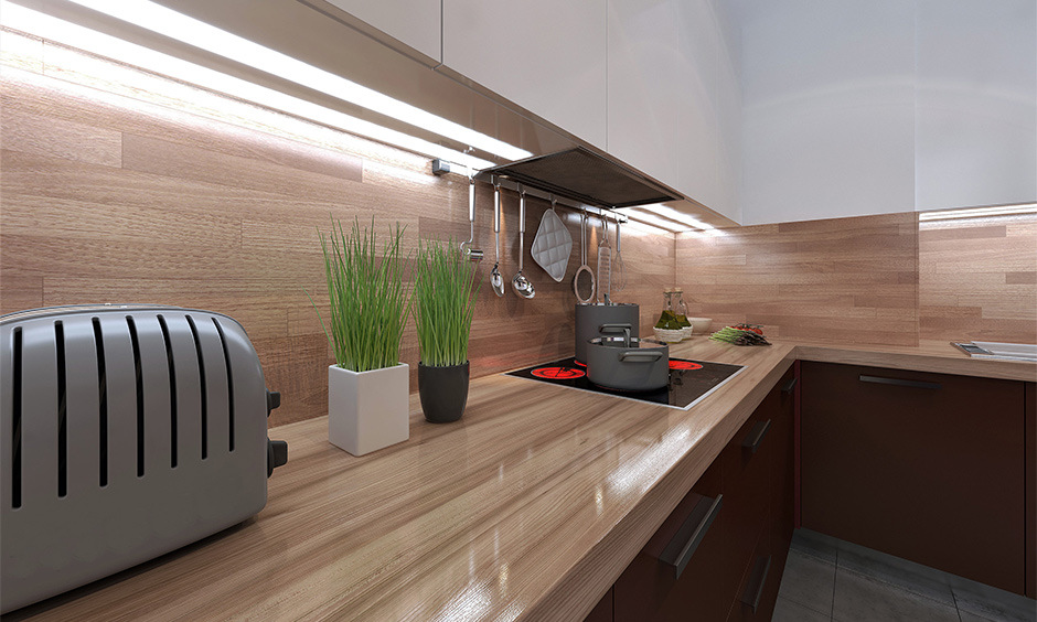 Modern kitchen with glossy laminates for a polished and spacious appearance