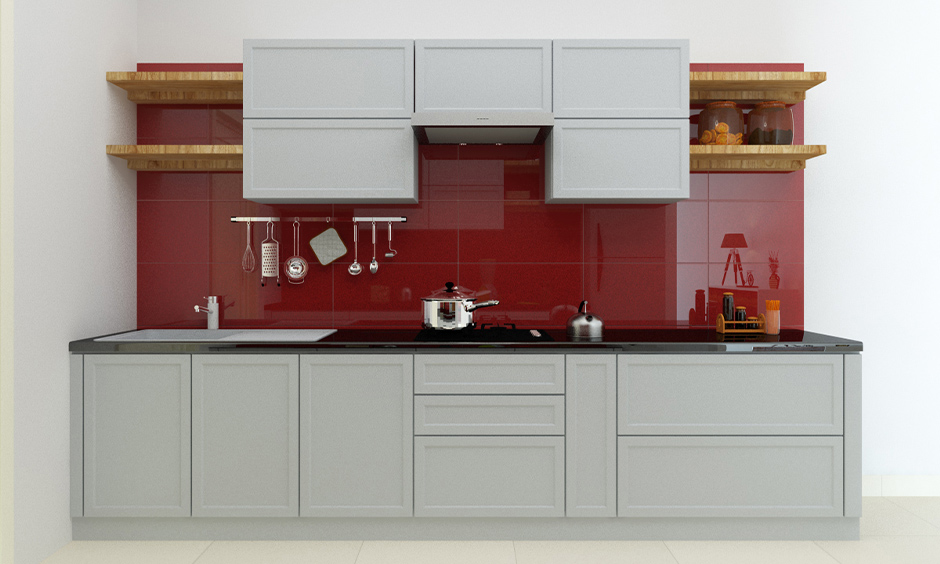 Stunning kitchen with a wine colour wall, adding sophistication and warmth to the culinary space