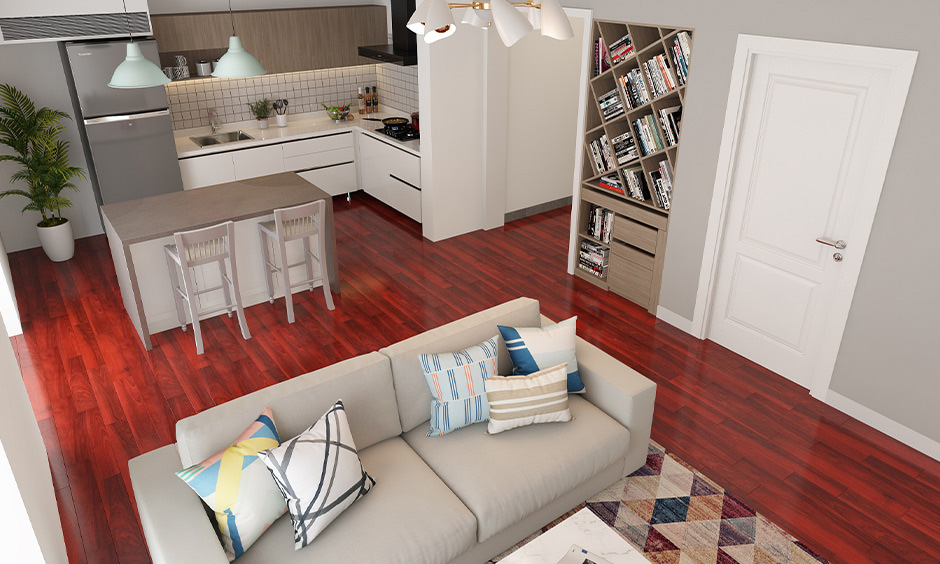 Red bamboo flooring creates natural, royal look in living space with palms, light grey furniture
