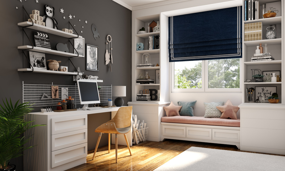 Built-in home office furniture with desks, shelving, and corner workstations.