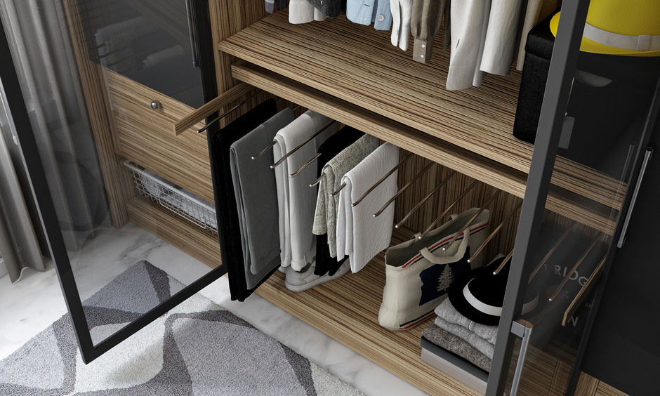 Built-in wardrobe internals with organised shelves and rods for efficient and stylish storage.