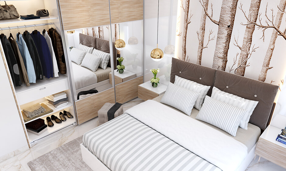 Compact bedroom built-in wardrobe with sliding door and mirror, saving space and adding modern flair.