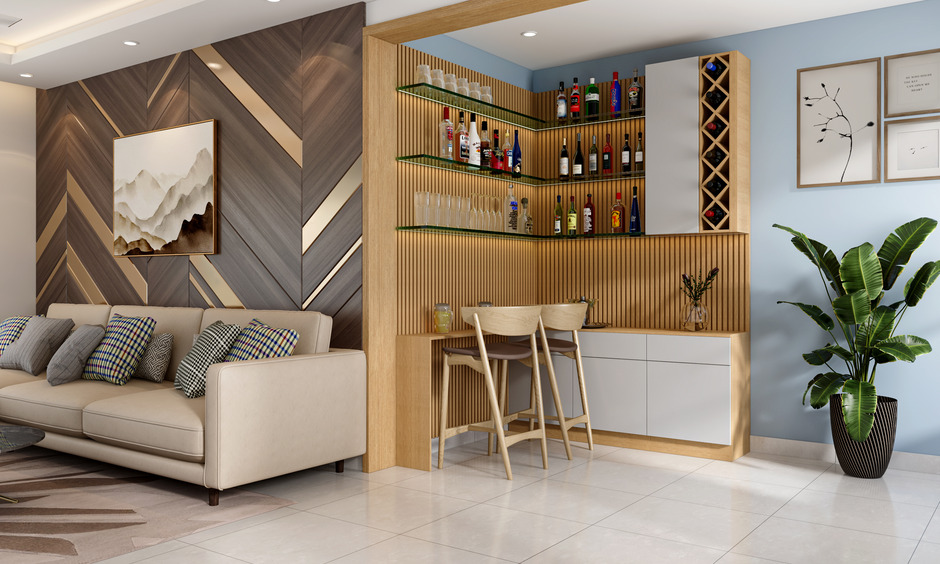 Elegant glass bar shelves displaying a premium liquor and glassware collection.