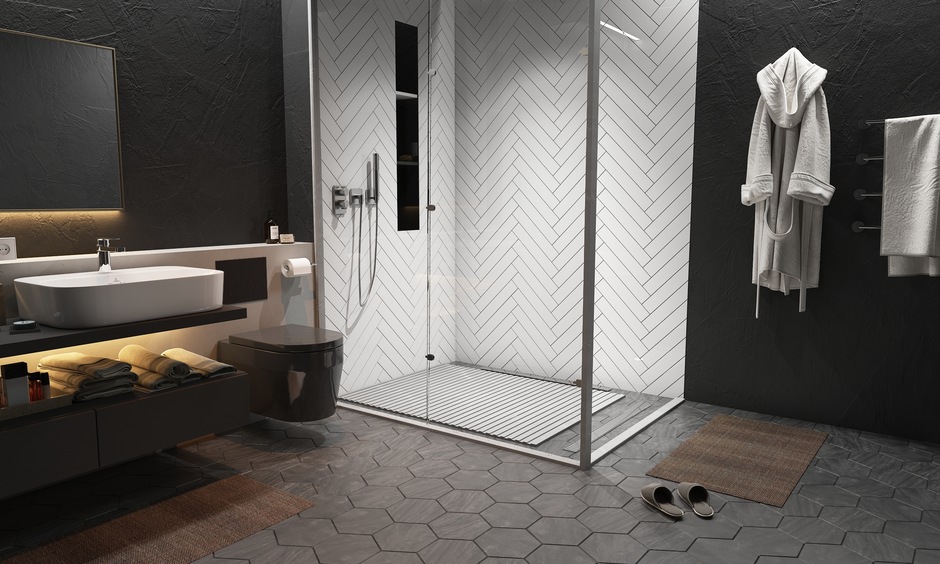 Hexagonal tiles in a black bathroom design create geometric patterns for a modern and stylish aesthetic.