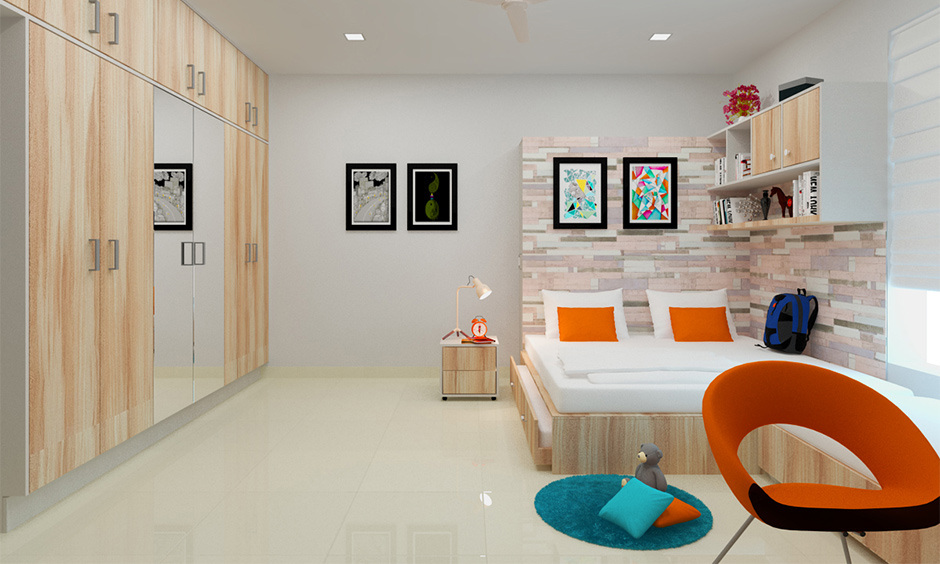 Master bedroom decor with a space-saving trundle bed, ample storage, and a mirrored wardrobe for a chic, spacious look.