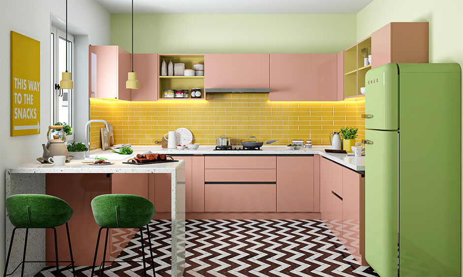Pastel pink kitchen cabinets shine in 2025 colour trends with retro-chic accents.