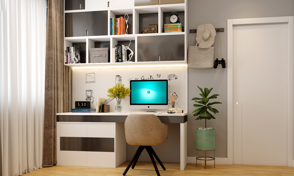 Compact study table with bookshelf design, ideal for small rooms and organising books and decor efficiently.