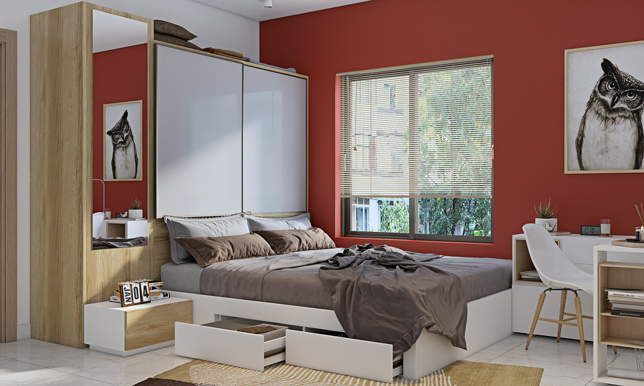 Functional sunmica box bed design with hidden storage, enhancing bedroom aesthetics while keeping it clutter-free.