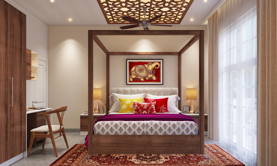 Traditional master bedroom decor with heritage-inspired artwork, soft lighting, and elegant ceiling design.