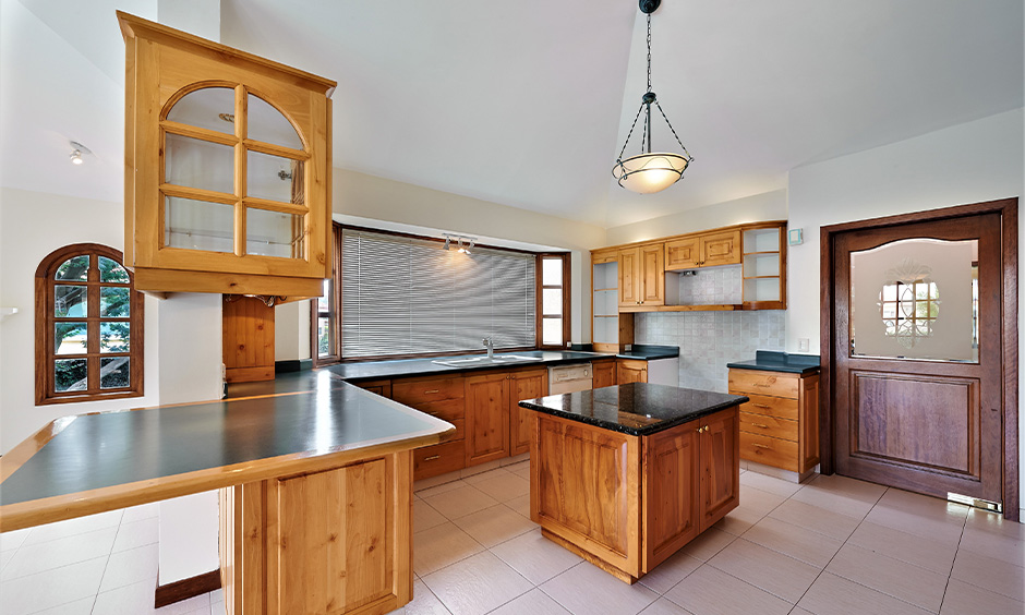 Classic wooden kitchen door design adding warmth, durability, and elegance to home interiors