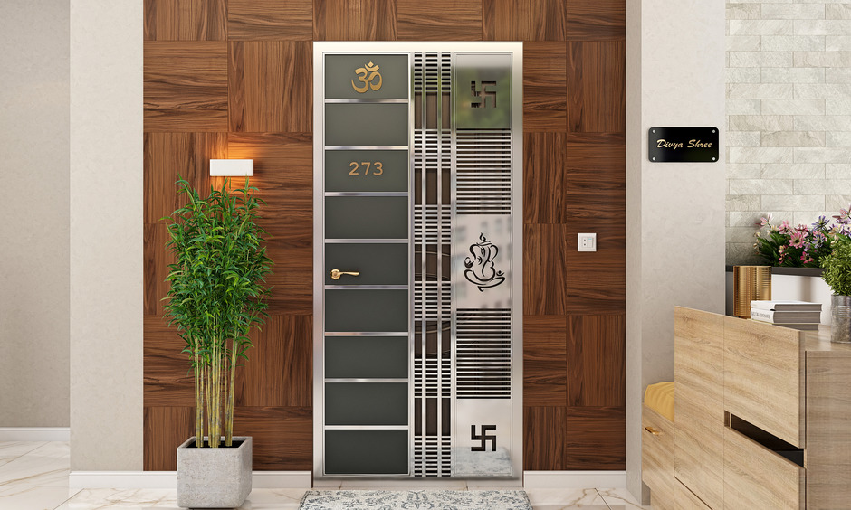 Modern veneer plank-style wooden tiles for a sleek front wall design.