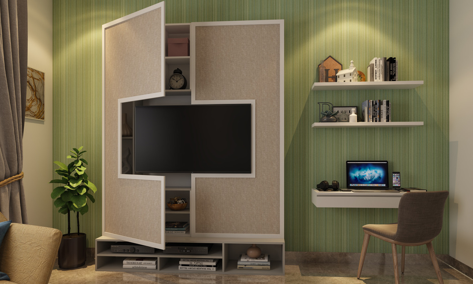 Stylish living room almirah design with hidden storage and tv unit for a modern multifunctional space