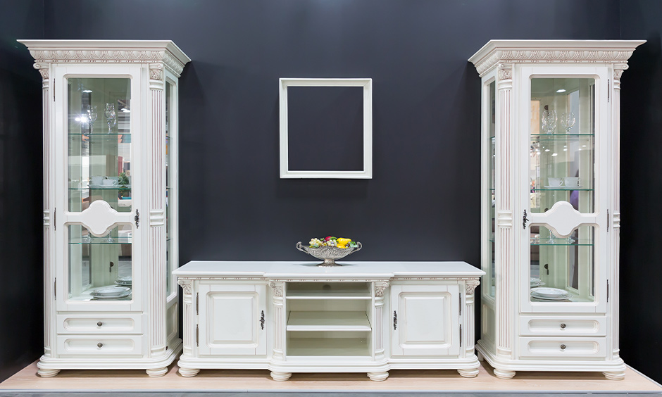 Antique-style glass almirah for living room with reflective panels and elegant storage display
