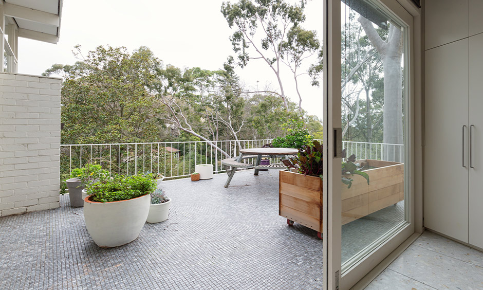 Balcony design with durable granite tiles for flooring