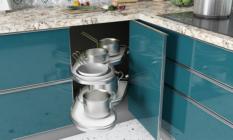 A rotating carousel unit provides easy access to hard-to-reach kitchen items.