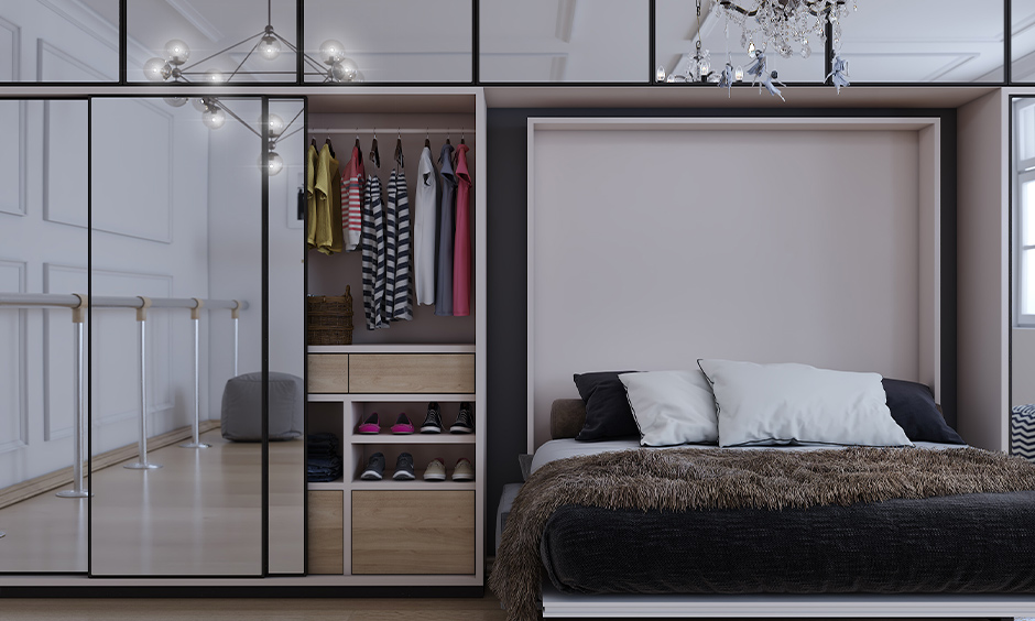 A stylish 3-door sliding wardrobe with mirrors enhances the space, combining functionality and elegance.