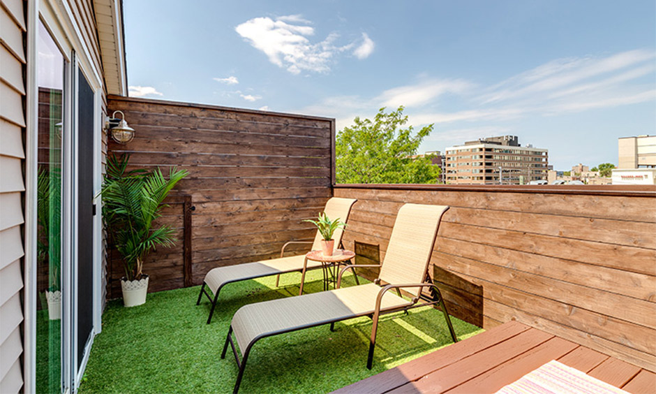 Balcony lounger duo with rust-resistant design, offering tropical vacation vibes at home.