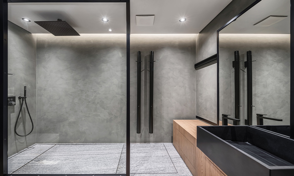 Sleek bathroom glass partition separating the shower area, keeping the rest of the bathroom dry and clean.