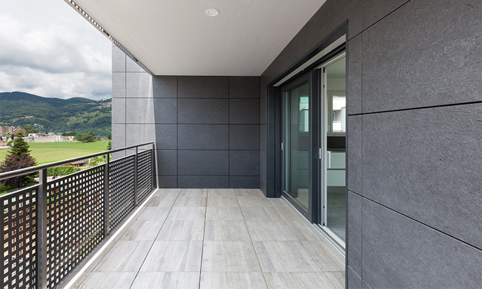 Modern stainless steel balcony grill design providing security and elegance, featuring smooth edges and glass for safety.