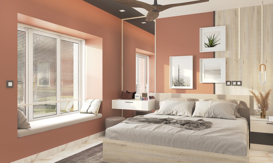 A cosy bedroom interior in the Pantone shade Mocha Mousse with elegant decor accents.