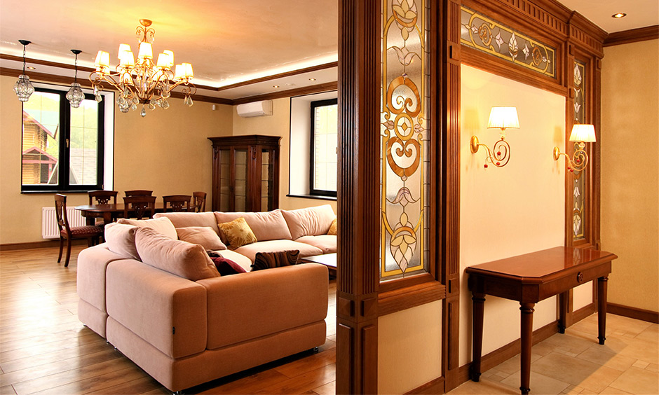 Wood and glass partition in the hall, creating a warm and elegant division without blocking natural light.