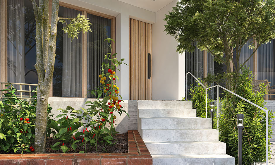 Modern steel stair railing design with decorative patterns adds elegance and curb appeal to the porch.