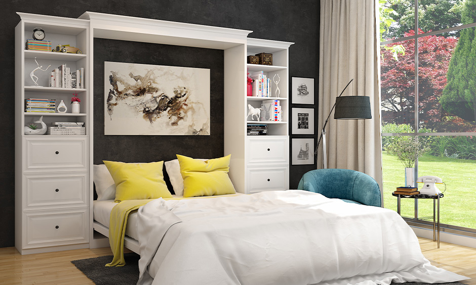 Modular bed design with lift-up Murphy bed framed by tall side cabinets for space-saving comfort.