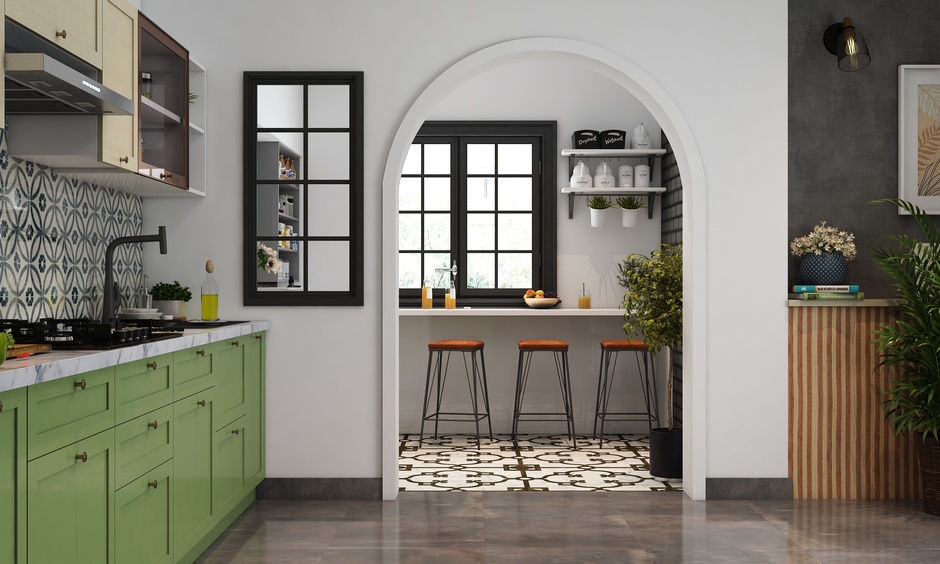 A pop arch design at a kitchen entrance with a semi-circular shape and minimalistic framing.
