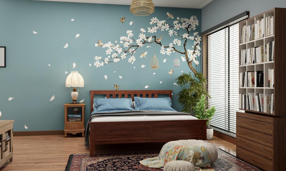 Soft cherry blossom floral wallpaper creates a peaceful, spring-inspired bedroom ambience.