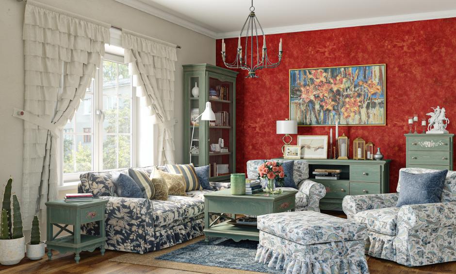 Vintage green bedroom design with floral prints and distressed furniture.