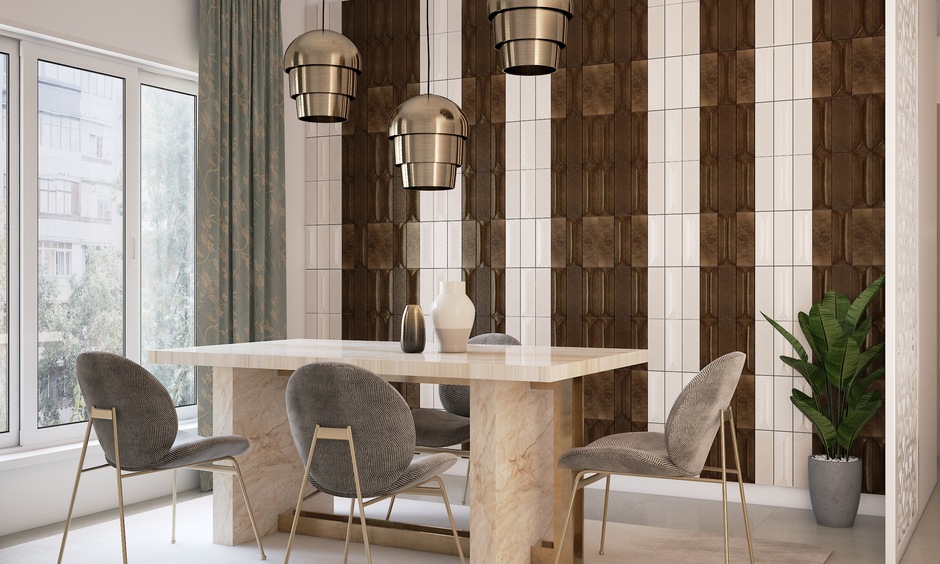 Elegant dining room featuring metallic dado tiles and pendant lighting
